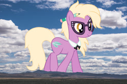 Size: 1400x933 | Tagged: safe, artist:starryshineviolet, derpibooru import, edit, editor:jaredking779, grace manewitz, earth pony, pony, background pony, female, giant pony, giantess, glasses, highrise ponies, irl, macro, mare, mountain, mountain range, pencil, photo, ponies in real life, solo