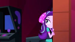 Size: 3072x1727 | Tagged: safe, derpibooru import, screencap, starlight glimmer, human, equestria girls, mirror magic, spoiler:eqg specials, beanie, breasts, canterlot mall, cinema, female, frown, hat, solo