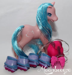 Size: 771x800 | Tagged: safe, derpibooru import, photographer:moonbreeze, earth pony, pony, g2, backpack, comb, female, glittery skater, mare, open mouth, photo, roller skates, rollerblades, signature, skates, solo, tinsel in mane, toy