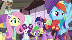 Size: 1280x720 | Tagged: safe, derpibooru import, screencap, discord, fluttershy, rainbow dash, rarity, spike, twilight sparkle, twilight sparkle (alicorn), alicorn, draconequus, dragon, pony, dungeons and discords, season 6, clothes, earmuffs, reaction image, scarf, sunglasses, train station, unamused, winter outfit