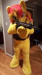 Size: 540x960 | Tagged: safe, artist:atalonthedeer, derpibooru import, sunset shimmer, human, unicorn, g4, 2016, aiming, ar-15, bulletproof vest, clothes, cosplay, costume, delet this, fursuit, gun, irl, irl human, magpul, photo, pony costume, rifle, smiling, smirk, weapon