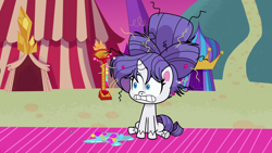 Size: 1280x720 | Tagged: safe, derpibooru import, rarity, pony, unicorn, g4.5, my little pony: pony life, what goes updo, spoiler:pony life s02e17, alternate hairstyle, blue eyes, female, long hair, long mane, mare, messy mane, purple hair, purple mane, sitting, solo, white fur