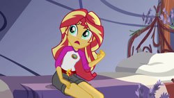 Size: 1192x670 | Tagged: safe, derpibooru import, screencap, sunset shimmer, equestria girls, legend of everfree, bed, camp everfree logo, camp everfree outfits, clothes, pants, sitting, solo