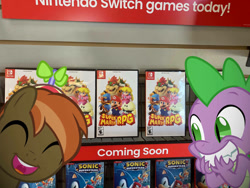 Size: 1032x774 | Tagged: safe, editor:undeadponysoldier, photographer:undeadponysoldier, button mash, spike, dragon, earth pony, pony, box art, buttonbetes, colt, cute, excited, foal, gamestop, grin, happy, hat, male, mall, nintendo, nintendo switch, propeller hat, shopping, shopping mall, spikabetes, super mario bros., super mario rpg, video game