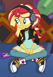 Size: 293x425 | Tagged: safe, derpibooru import, screencap, sunset shimmer, human, better together, equestria girls, game stream, clothes, cropped, cute, dress, gamer sunset, headphones, jacket, leather, leather jacket, pants, shimmerbetes, sofa, solo, sunset's apartment, trainers