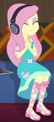 Size: 236x532 | Tagged: safe, derpibooru import, screencap, fluttershy, human, better together, equestria girls, game stream, clothes, cropped, cute, dress, eyeshadow, fluttershy boho dress, gamer fluttershy, headphones, makeup, pink eyeshadow, shyabetes, smiling, sofa, solo, sunset's apartment