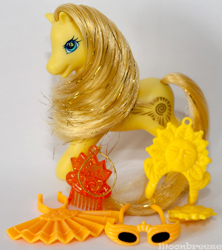 Size: 711x800 | Tagged: safe, derpibooru import, photographer:moonbreeze, princess golden light, earth pony, pony, g2, comb, crown, fan, female, jewelry, mare, open mouth, open smile, photo, raised hoof, raised leg, regalia, smiling, solo, sunglasses, toy