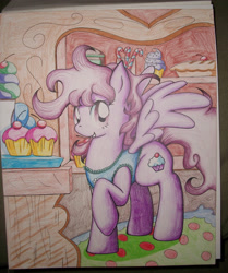 Size: 2442x2928 | Tagged: safe, artist:foxbeast, derpibooru import, oc, oc only, pegasus, clothes, cupcake, food, grin, high res, pegasus oc, raised hoof, raised leg, smiling, solo, spread wings, traditional art, wings