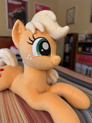 Size: 3072x4096 | Tagged: safe, artist:littlefairyswonders, derpibooru import, applejack, earth pony, pony, g4, cute, female, indoors, irl, jackabetes, lying down, missing accessory, photo, plushie, solo