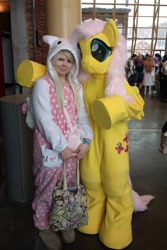 Size: 600x900 | Tagged: safe, derpibooru import, fluttershy, human, 2013, clothes, cosplay, costume, desucon frostbite, duo, fursuit, indoors, irl, irl human, photo, ponysuit