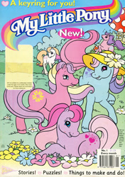 Size: 700x994 | Tagged: safe, derpibooru import, ivy, light heart, sundance (g2), sweet berry, earth pony, pony, g2, barcode, building, comic cover, core four, cover, cover art, female, flower, grass, group, hat, lying down, mare, morning glory (g2), mushroom, my little pony logo, my little pony vol. 2, my little pony vol. 2 #1, official comic, outdoors, prone, raised hoof, raised leg, redan, smiling, starry eyes, tail, unshorn fetlocks, wingding eyes