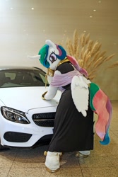 Size: 600x900 | Tagged: safe, artist:toki, derpibooru import, princess celestia, 2017, butt wings, car, clothes, dress, fursuit, indoors, irl, jewelry, photo, ponysuit, rear view, regalia, solo, wings