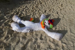 Size: 1200x800 | Tagged: safe, derpibooru import, oc, oc only, oc:collar dash, 2018, beach, flüüfff, fursuit, irl, lying down, on back, photo, ponysuit, sand, seaside, solo, spread arms