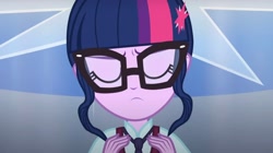 Size: 2160x1209 | Tagged: safe, derpibooru import, screencap, sci-twi, twilight sparkle, human, equestria girls, friendship games, g4, clothes, crystal prep academy, crystal prep academy uniform, eyes closed, hair bun, necktie, sad, school, school tie, school uniform, schoolgirl, solo, song, uniform, what more is out there