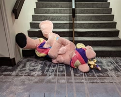 Size: 2048x1643 | Tagged: safe, artist:qtpony, artist:zizzydizzymc, derpibooru import, princess cadance, g4, family guy death pose, female, fursuit, indoors, irl, on ground, photo, ponysuit, solo, stairs