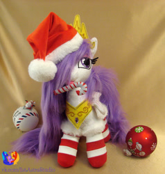 Size: 1280x1347 | Tagged: safe, artist:1stastrastudio, derpibooru import, princess celestia, pony, candy, candy cane, clothes, food, irl, mouth hold, photo, plushie, princess molestia, socks, solo, striped socks