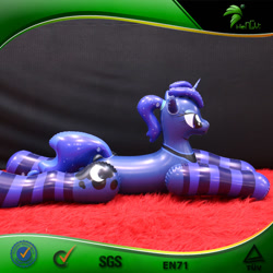 Size: 750x750 | Tagged: safe, derpibooru import, princess luna, inflatable pony, pony, unicorn, g4, bootleg, clothes, facing right, female, frame, hongyi, horn, inflatable, inflatable unicorn, inflation valve, irl, lying down, mare, opaque inflatable, peytral, photo, ponytail, prone, race swap, socks, solo, striped socks, unicorn luna