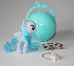 Size: 1000x898 | Tagged: safe, derpibooru import, pegasus, pony, bootleg, female, mare, not rainbow dash, not rarity, photo, rainbow 彩虹小马, solo, sticker, toy