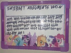 Size: 863x640 | Tagged: safe, derpibooru import, applejack, fluttershy, pinkie pie, rainbow dash, rarity, score, twilight sparkle, twilight sparkle (alicorn), alicorn, earth pony, pegasus, pony, unicorn, g4, counting, dry erase board, female, horn, internet argument, irl, mane six, mare, meme, merchandise, my little board, needs more jpeg, photo, sextet, tally marks, whiteboard