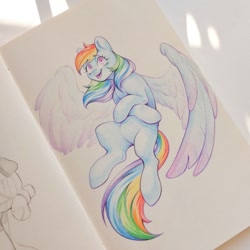 Size: 1280x1280 | Tagged: safe, artist:amishy, derpibooru import, rainbow dash, pegasus, pony, g4, colored pencil drawing, crossed hooves, female, flying, large wings, looking at you, mare, missing cutie mark, open mouth, open smile, smiling, smiling at you, solo, spread wings, traditional art, wings