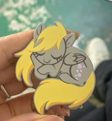 Size: 564x610 | Tagged: safe, artist:sophie scruggs, derpibooru import, derpy hooves, pony, g4, eyes closed, irl, photo, pins, solo