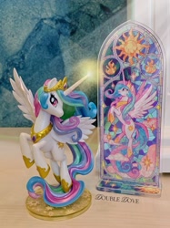 Size: 2441x3255 | Tagged: safe, derpibooru import, princess celestia, alicorn, g4, acrylic plastic, acrylic standee, cloud, craft, indoors, kotobukiya, kotobukiya princess celestia, looking at you, magic, magic aura, merchandise, official, solo, spread wings, stained glass, stars, sun, wings