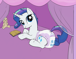 Size: 1411x1105 | Tagged: safe, artist:drasill, derpibooru import, rarity, pony, unicorn, g4, book, diaper, diaper fetish, fetish, horn, indoors, looking at you, lying down, non-baby in diaper, plushie, smiling, smiling at you