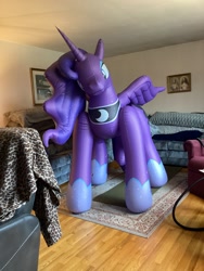 Size: 2448x3264 | Tagged: safe, artist:tbolt, derpibooru import, princess luna, alicorn, inflatable pony, pony, g4, carpet, female, framed picture, head tilt, indoors, inflatable, inflatable alicorn, inflation valve, irl, looking at you, mare, opaque inflatable, peytral, photo, seams, solo, standing, wrinkles