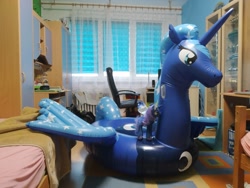 Size: 2000x1500 | Tagged: safe, artist:lorax xyz, artist:loraxxyz, derpibooru import, princess luna, alicorn, inflatable pony, pony, carpet, chair, computer desk, desk, female, floaty, horseplaytoys, indoors, inflatable, inflatable alicorn, inflatable float, irl, luna plushie, mare, office chair, photo, plushie, pony plushie, pool toy, window