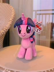 Size: 2030x2707 | Tagged: safe, derpibooru import, twilight sparkle, twilight sparkle (alicorn), alicorn, pony, g4, chair, fixed, front view, irl, merchandise, miniso, official, photo, plushie, pony plushie, reesee, reflection, smiling, solo