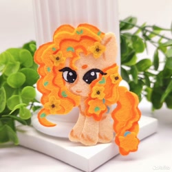 Size: 960x960 | Tagged: safe, artist:sofia metropolskaya, derpibooru import, pear butter, earth pony, g4, chibi, craft, cute, felt, felting, handmade, looking away, photo, plant, smiling, standing