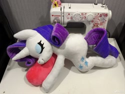 Size: 1278x960 | Tagged: safe, artist:elizaveta medved, derpibooru import, rarity, unicorn, g4, cute, handmade, horn, lying down, photo, plushie, raribetes, sewing machine, sleeping