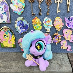 Size: 1728x1728 | Tagged: safe, artist:drtuo4, artist:sophie scruggs, derpibooru import, photographer:brella, radiant hope, pony, g4, irl, key, key of generosity, key of honesty, key of kindness, key of laughter, key of loyalty, photo, pins, plushie, pony plushie