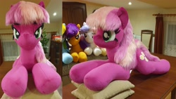 Size: 4032x2268 | Tagged: safe, artist:ponimalion, derpibooru import, cheerilee, pony, g4, bedroom eyes, female, indoors, irl, lidded eyes, life size, mare, photo, pillow, plushie, smiling, tail