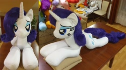 Size: 4032x2236 | Tagged: safe, artist:ponimalion, derpibooru import, rarity, pony, unicorn, g4, bedroom eyes, eyeshadow, female, horn, indoors, irl, lidded eyes, life size, makeup, mare, photo, pillow, plushie, smiling, tail