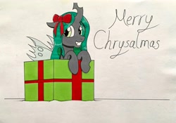 Size: 3500x2445 | Tagged: safe, artist:killerteddybear94, derpibooru import, queen chrysalis, changeling, changeling queen, pony, g4, bow, box, changeling in a box, christmas, christmas changeling, cute, cutealis, hair bow, holiday, looking at you, pony in a box, present, pun, traditional art