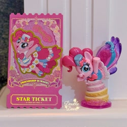 Size: 2254x2254 | Tagged: safe, derpibooru import, pinkie pie, earth pony, pony, g4, cake, card, clothes, double dove, dress, figure, flower, food, grand galloping gala, hat, indoors, irl, jumping, kayou, looking at you, merchandise, official, open mouth, open smile, outfit, photo, raised hoof, raised leg, side view, smiling, text, toy