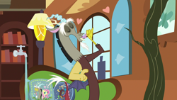 Size: 1280x720 | Tagged: safe, derpibooru import, screencap, discord, draconequus, discordant harmony, g4, cup, fluttershy's cottage (interior), solo, teacup