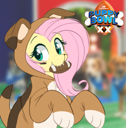 Size: 839x853 | Tagged: safe, artist:higglytownhero, derpibooru import, fluttershy, pegasus, pony, american football, beautiful, clothes, costume, cute, dog costume, female, flutterdog, halfbody, irl, kigurumi, looking at you, mouth hold, onesie, photo, pretty, puppy bowl, shyabetes, solo, sports