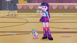 Size: 1920x1080 | Tagged: safe, derpibooru import, screencap, spike, twilight sparkle, dog, human, equestria girls, equestria girls (movie), g4, boots, camera, chair, clothes, confused, eyebrows, high heel boots, legs, raised eyebrow, shirt, shoes, skirt, stage