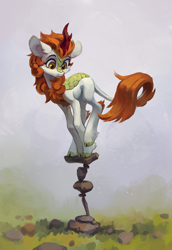 Size: 2413x3511 | Tagged: safe, artist:koviry, derpibooru import, autumn blaze, kirin, pony, g4, awwtumn blaze, balancing, cairn, cloven hooves, colored hooves, confused, cute, digital painting, ear fluff, ears, female, frown, grass, high res, leg fluff, leonine tail, long legs, looking down, mare, raised hoof, raised leg, rock, solo, tail, wide eyes