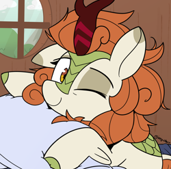 Size: 2168x2142 | Tagged: safe, artist:icey, derpibooru import, autumn blaze, kirin, g4, awwtumn blaze, bed mane, cute, looking at you, one eye closed, pillow, sleepy, smiling, smiling at you