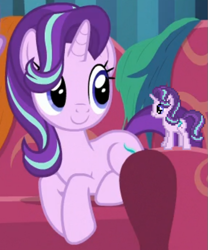 Size: 505x607 | Tagged: safe, derpibooru import, screencap, starlight glimmer, pony, unicorn, g4, it isn't the mane thing about you, april fools 2024, behaving like a cat, cropped, cute, desktop ponies, female, glimmerbetes, hair over one eye, horn, mare, pixel art, self paradox, self ponidox, sitting, smiling, sofa, solo, sprite