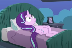 Size: 694x466 | Tagged: safe, derpibooru import, screencap, starlight glimmer, pony, unicorn, every little thing she does, g4, bed, belly, cropped, horn, indoors, looking up, lying down, on back, on bed, round belly, solo, stare