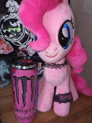 Size: 712x949 | Tagged: safe, derpibooru import, pinkie pie, earth pony, original species, pony, blue eyes, bracelet, choker, drink, energy drink, front facing, front view, hair over one eye, irl, jewelry, light switch, monster energy, photo, pink coat, pink mane, plush pony, plushie, solo, sticker, tumblr, wooden table