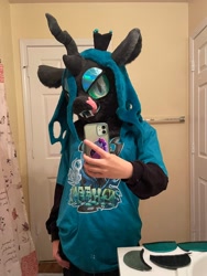 Size: 1536x2048 | Tagged: safe, artist:limeythecheetah, derpibooru import, queen chrysalis, changeling, changeling queen, fursuit, hand on hip, indoors, irl, phone, photo, selfie, tongue, tongue out