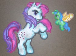 Size: 600x448 | Tagged: safe, artist:sparksparkles, derpibooru import, moondancer (g1), breezie, pony, unicorn, g1, g3, craft, g1 to g3, generation leap, horn, my little pony: pinkie pie's party, perler beads, rearing, unnamed breezie, unnamed character