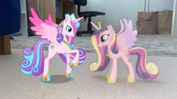 Size: 4032x2268 | Tagged: safe, derpibooru import, princess cadance, princess flurry heart, alicorn, pony, g4, 3d, 3d model, adult flurry heart, augmented reality, chair, concave belly, crown, duo, female, funko, gameloft, height difference, hoof shoes, irl, jewelry, looking at each other, looking at someone, mare, mother and child, mother and daughter, my little pony: magic princess, older, older flurry heart, parent and child, peytral, photo, ponies in real life, raised hoof, raised leg, regalia, rug, slender, spread wings, tall, thin, toy, wings