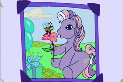 Size: 720x480 | Tagged: safe, derpibooru import, screencap, wysteria, bee, earth pony, insect, pony, a charming birthday, g3, balloon, birthday book, cloud, female, flower, hoof hold, looking at something, mare, open mouth, outdoors, ponyville surprise birthday book, present, scrapbook, sitting, solo