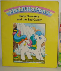 Size: 296x346 | Tagged: safe, derpibooru import, baby quackers, earth pony, pony, g1, baby quackers and the sad quolly, book, book cover, bow, cover, female, filly, foal, official, solo, tail, tail bow, water, waterfall